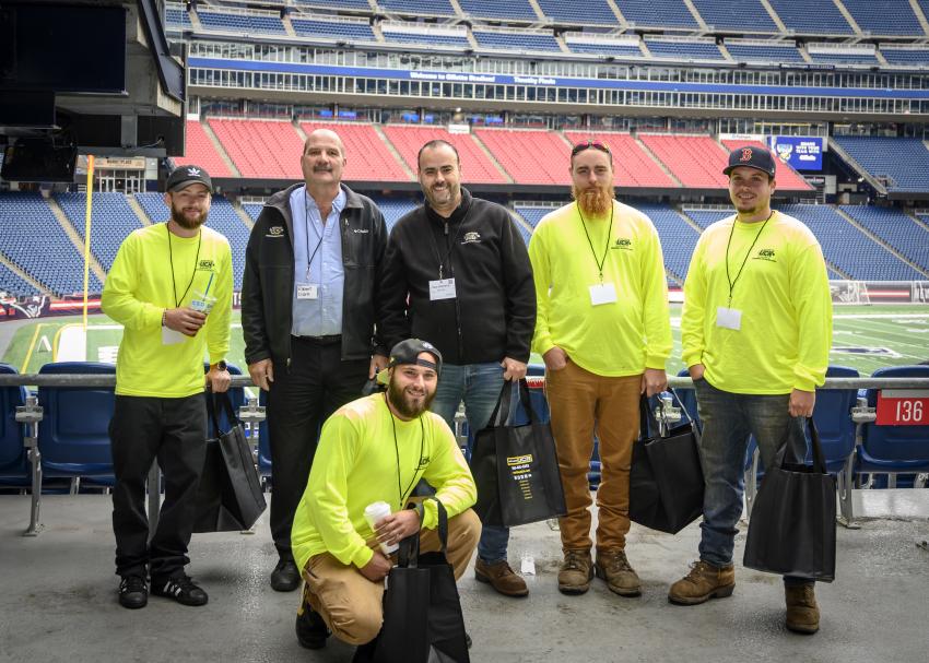 (L-R): Tom Stanley, Rob Clark, Tyler Walsh, Eric Walsh, Gus Moreira, (front), Eric Stenmen, all of UCX in West Boylston, Mass., enjoy the view of Gillette Stadium. 