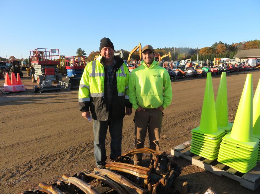 Father and son team, Todd (L) and Ryan Thurs, owners of Thurs Logging in Athens, Wis., came to see if they could take home some equipment for their logging operation.
