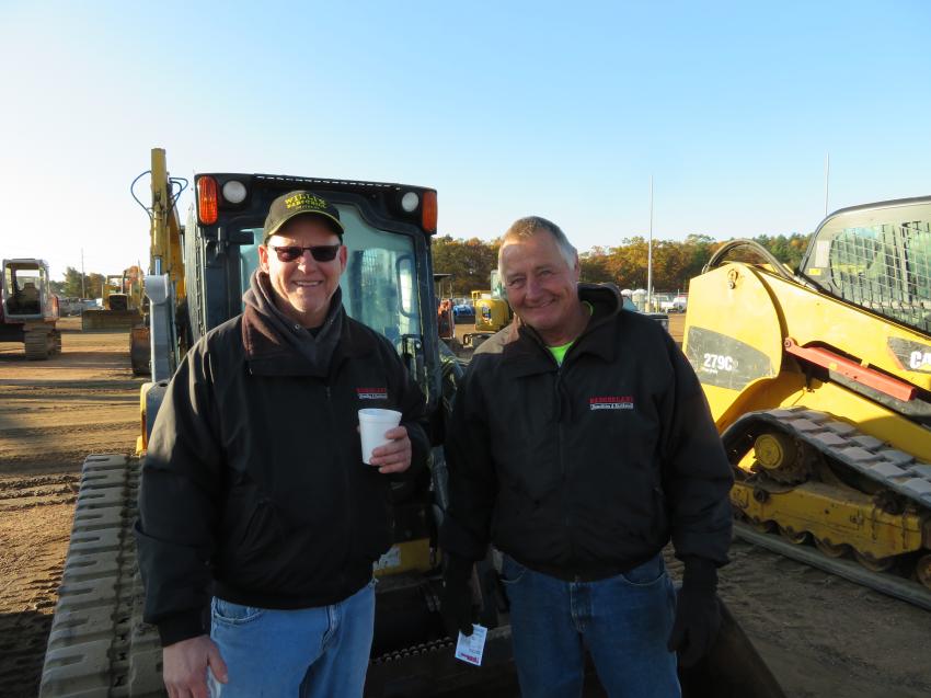 Dave Williquette (L) and Donny Schwartz, both of Badgerland Demolition and Earthworks, look over the iron at Nitke’s 54th annual auction.
