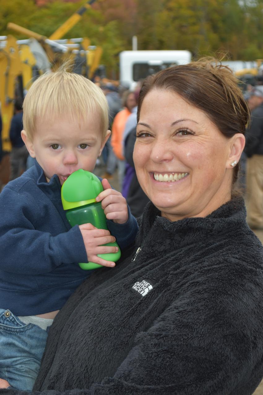 Stacy Dennis and her grandson, Mark Swiatowiec III, from Cedar Ridge Construction in Newington, Conn., are shopping for mini-excavators at the auction.