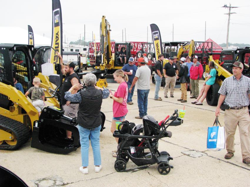 Attendees swarmed the Yancey Bros. Co. display area to see a vast array of Cat machines and attachments on display and to check out the 0 percent for 60 months finance deal they were promoting.