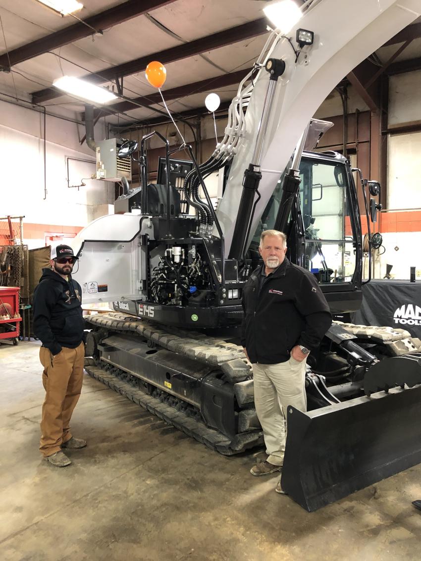 Cameron Barbee (L) and Wes Malone, both of All-American Contracting in Monroe, look over the Bobcat E145 excavator. The 14-ton turbo-charged Bobcat E145 excavator is a larger machine that’s ideal for roadways, railroad, bridges and infrastructure, commercial and urban job sites. The reduced tail swing allows for greater maneuverability in tight job sites, so you can confidently work around obstacles or against walls.