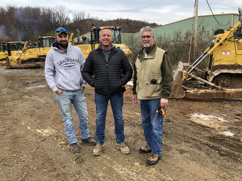 (L-R): Brandon Henkes and Terry Parks, both of AAA Paving in Princeton, W.Va., caught up with their Rudd Equipment salesman, Rob Newsome.