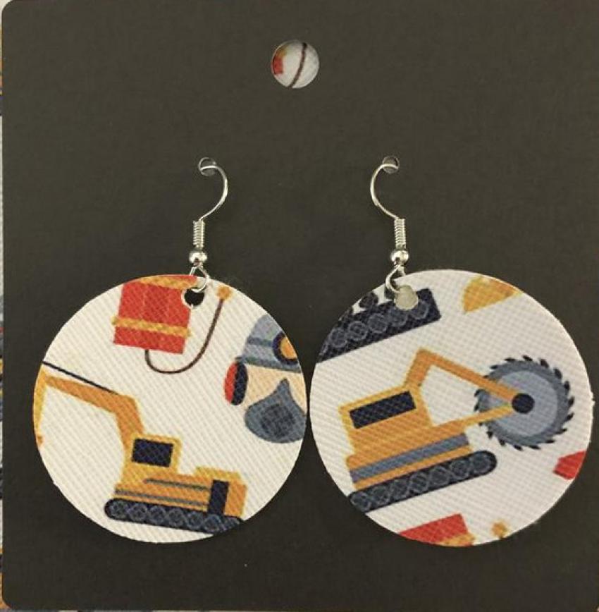 Construction-Themed Earrings These whimsical construction earrings are sure to put a smile on anyone’s face! The fashion-forward, faux leather cutouts come in a variety of sizes and shapes and feature backhoes, dump trucks, mining equipment and more. $6