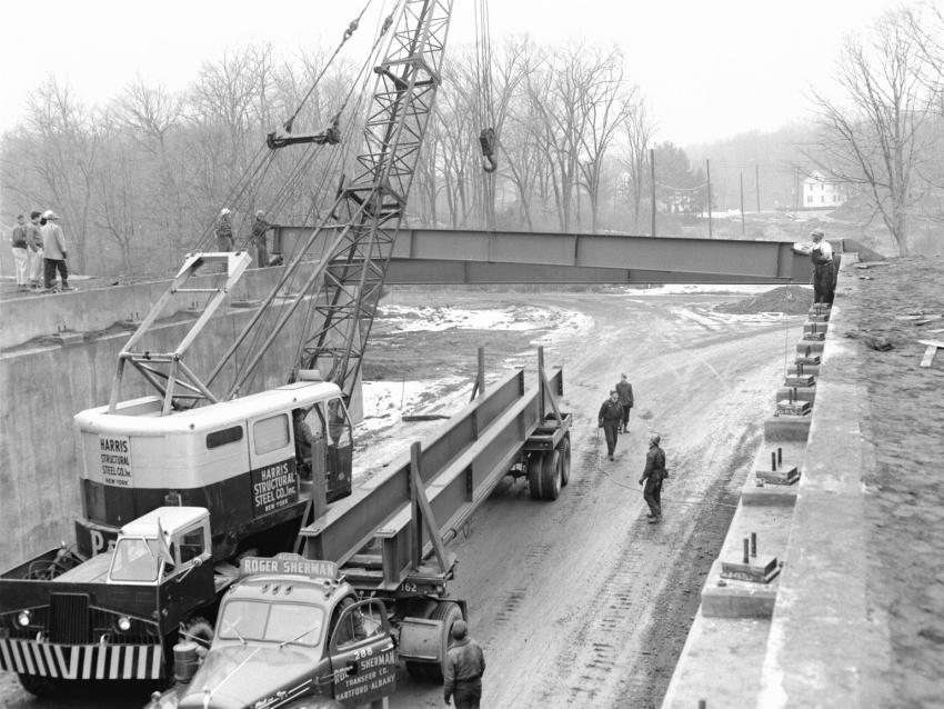 The P&H crane continues to hoist the steel beams into place. The beams were hauled to the project by Roger Sherman Transfer Company of Hartford, Conn. The truck tractor is a B-model Mack.
(CTDOT photo)
