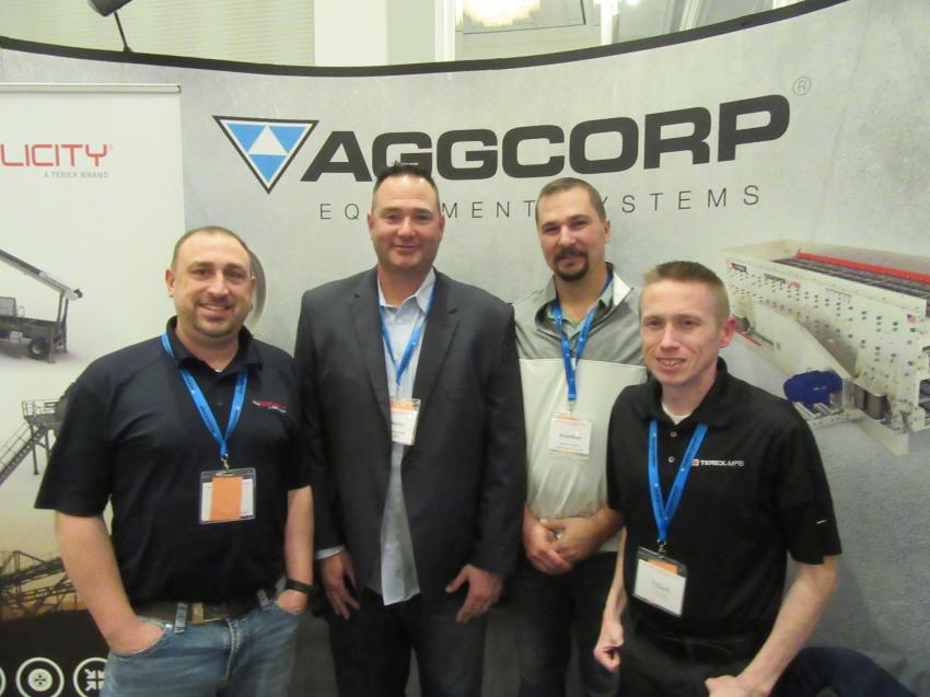 (L-R): At AGGCORP’s tabletop exhibit, Russ Burns, MPS sales manager of Terex Corporation, joined AGGCORP’s Roberto Armbruster to speak with Jonathan Stock of Tiger Sand & Gravel and Elliott Tribble, regional sales manager of Terex Cedarapids.  
