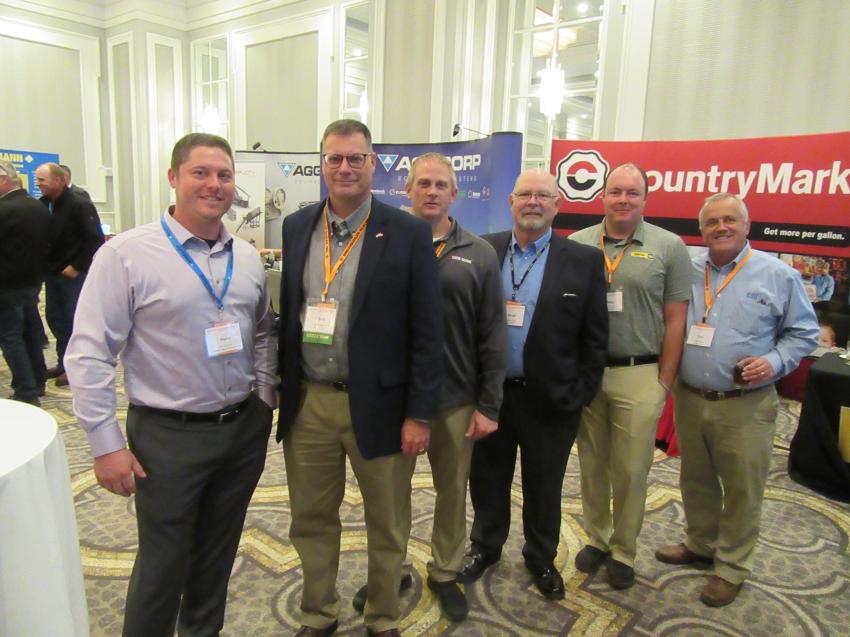 (L-R): Lakeside Sand & Gravel’s Steve Chek spoke with Ohio Cat’s Chris Harris and Screen Machine SMI’s Timm Miller along with Ohio Cat’s Brad Friend, Mike Cullen and Ned Herald.
