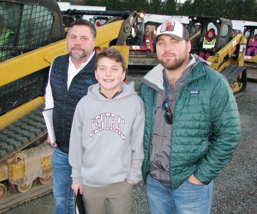 Regular buyers and sellers who make it to almost all the metro Atlanta Ritchie Bros. auctions (L-R) are James Morehead and his sons, Caden and Blake Morehead, of Complete Demolition, Carrollton, Ga. 