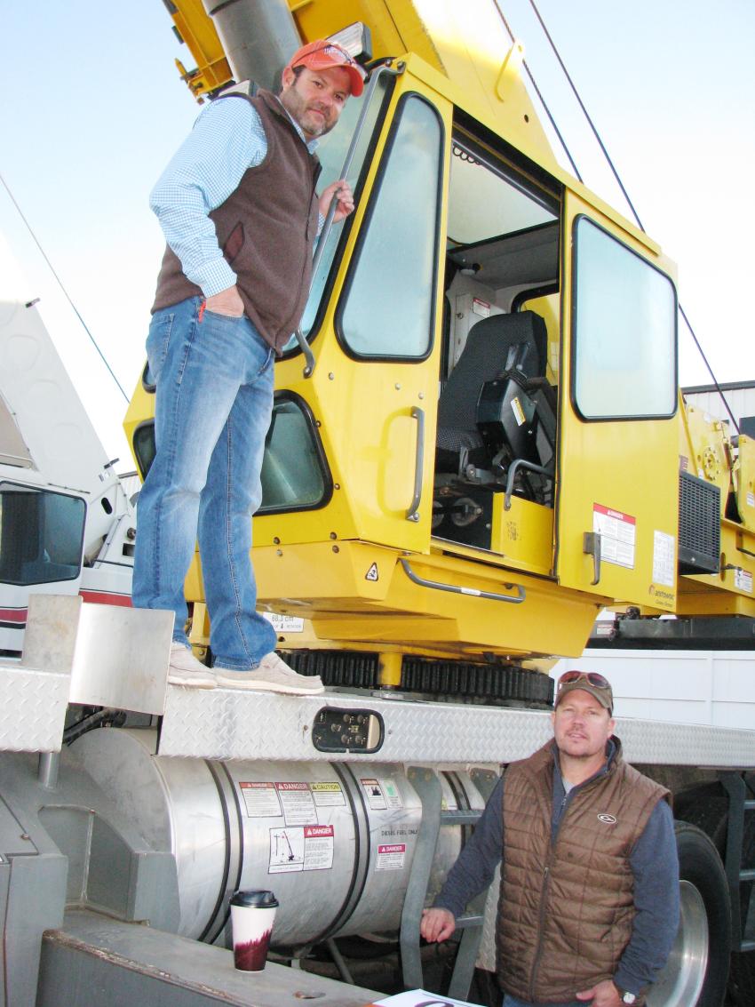 Chris Hayden (above L) and Mike Burton (below R) of Marshall Crane & Equipment, Calvert City, Ky., were all over this Grove TMS700E hydraulic truck crane before placing it on their bidding list.