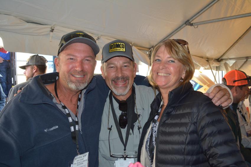 (L-R): Brad and Mark Tafel and Sharon Lawson of Top Gun Top Dog Inc., an earthmoving contractor from Leonard, Texas, enjoy their day at Texas Motor Speedway.

