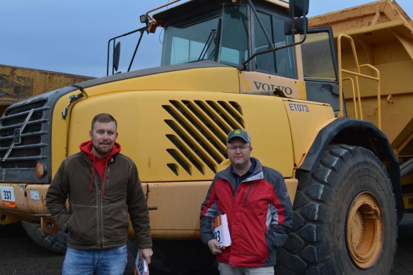 The Volvo A40D articulated hauler caught the attention of Elwin (L) and Eddie Peters at the Fort Worth sale. The Peters operate Pro Aggregate of Andrews, Texas.