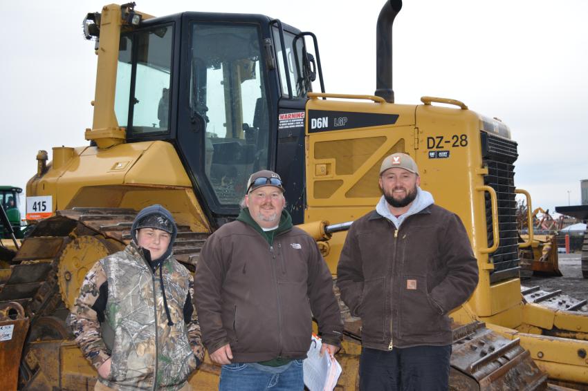 (L-R): Hunter and Chad Eubanks and Shawn Mote of 3E Dozer Service put this Cat D6N through its paces before bidding in Fort Worth. 3E Dozer Services is located in Dickson, Okla.
