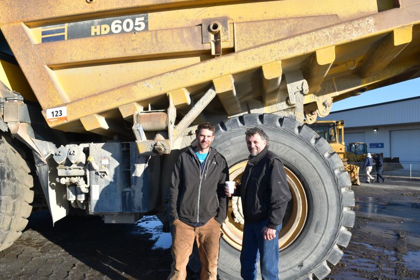 Anthony Boyer, a mechanic, and Dale Fairgrieve, a salesman, both of Bill Miller Equipment, Frostburg, Md., were dwarfed by this Komatsu HD605 tire, despite both men being more than 6 ft. tall! 