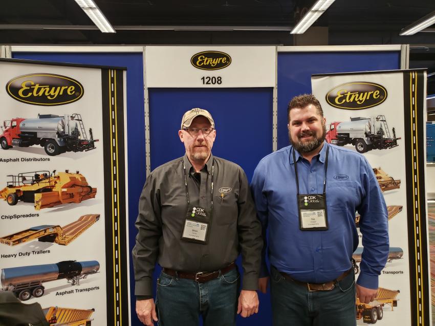 Brian Horner (L), regional manager of Etnyre, and Tim Krueger, sales administrator of Etnyre, have information on the company’s wide range of products.