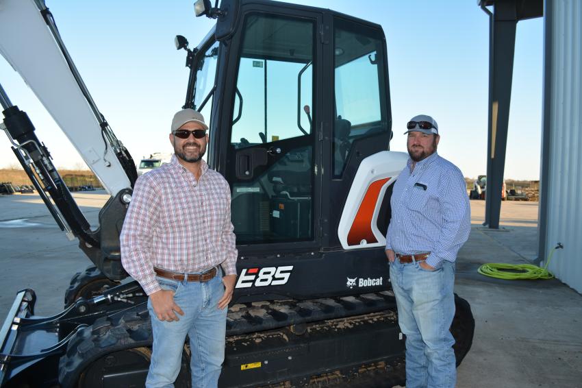 Rexco’s Beau Villarreal (L) checks out the Bobcat E85 compact excavator with Dustin Metting of Bobcat of Victoria. Rexco is a general contractor based in Port Lavaca.
