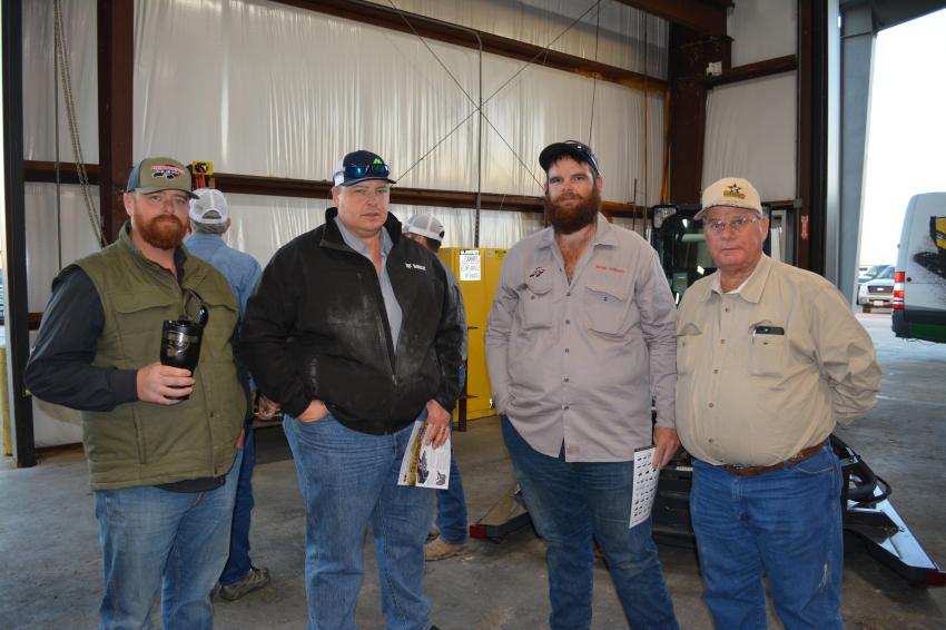 (L-R): Tyler Lafour of Victoria contractor Harrison and Son, Clayton Heldt of SCT Building Systems and Coastal Landscape, Bobcat customer Brian Wilborn and Jack Daniels of Brannan Paving.
