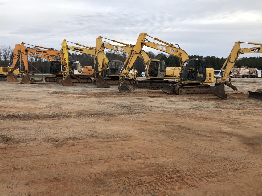 The cold day kept many of the bidders inside. When the excavators were sold they surpassed expectations.