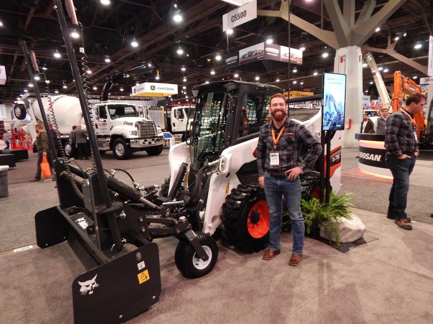 Tyler Zima, Bobcat loader product specialist, shows off the popular Bobcat S76 skid steer loader, which is a vertical lift path machine. The inline engine design and durable direct-drive system delivers the performance and durability required on today’s job sites. The one-piece sealed and pressurized cab decreases noise level inside the cab and lessens the amount of dirt and dust that can enter the cab.

