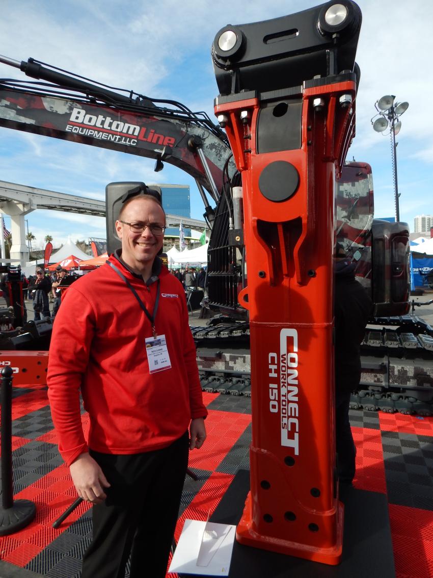 Rich Currie, vice president of sales, Connect Work Tools, with the Hydraulic Breaker Series CH150.