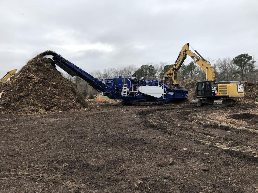 Peterson’s 5710D horizontal grinder and this Cat 330F excavator work well together.
