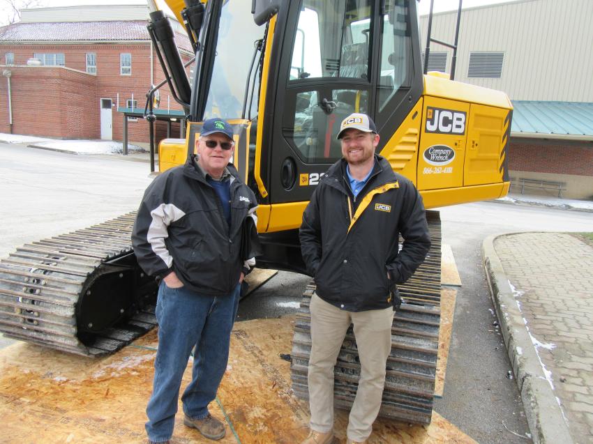 Bruce Miley (L) of Miley Excavating spoke with Tom O’Leary, JCB product sales specialist, about this JCB 220X LC excavator on display at the Company Wrench demo day event.
