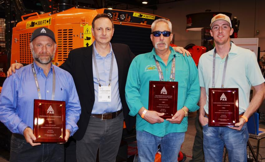 Individual awards for purchases of FAE products were presented to (L-R): John Deluca, owner, ADeluca Paving and Reclamation; Giorgio Carera, CEO, FAE USA; Dave DeMenno, owner, Alaska Hydro-ax; and Wesley Funderburk, owner, Re-gen Earth Solutions.