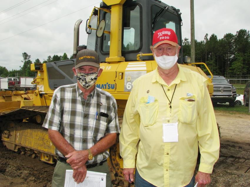Dozers were on the mind of independent contractors Ken McDonald (L) and Paul Sumrall of Laurel, Miss.  
