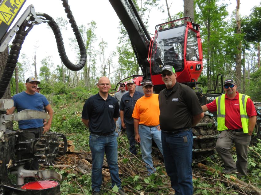 David Rickert of Rickerts Excavating; Dan Eaton of Roland Machinery Co.; Duaine Gibbs, owner of Duaine Gibbs Logging; Mark Spoehr of Roland Machinery Co.; and Brad Jackson of Roland Machinery Co., were on hand to see what the Komatsu 901xc harvester could do. 
