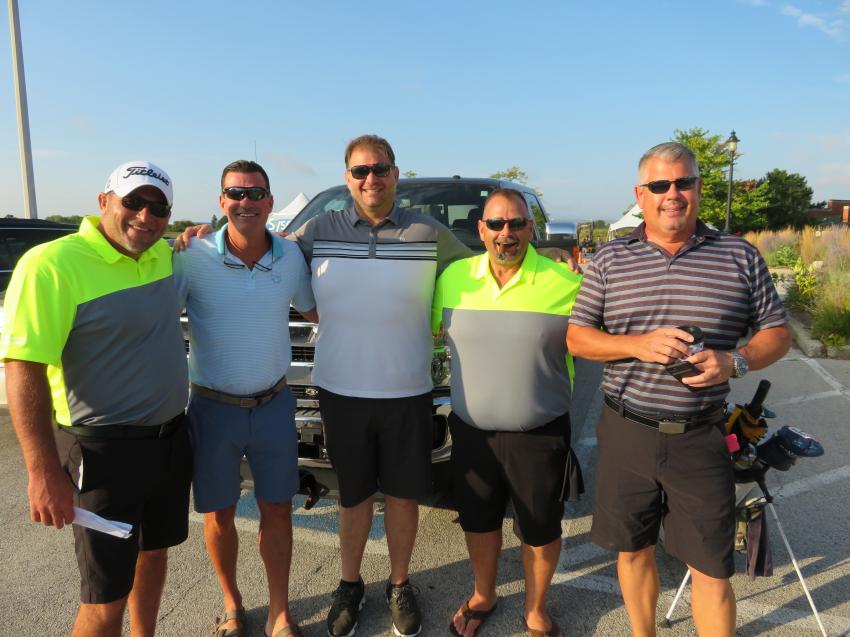 (L-R): Mike Jaworski, director of sales of Alta Equipment; Mike Bryan of Geneva Construction; Josh Zenere of Zenere Companies; Mike Dahlen, vice president of operations of Alta Equipment; and Craig Melby of Viking Brothers Inc. are ready to play.