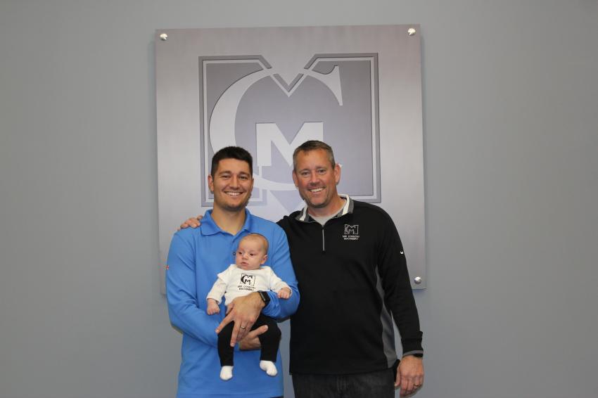 Lucas Peed (R), co-owner of Mid Country Machinery, is with his son, Landon, and grandson, Tucker.
