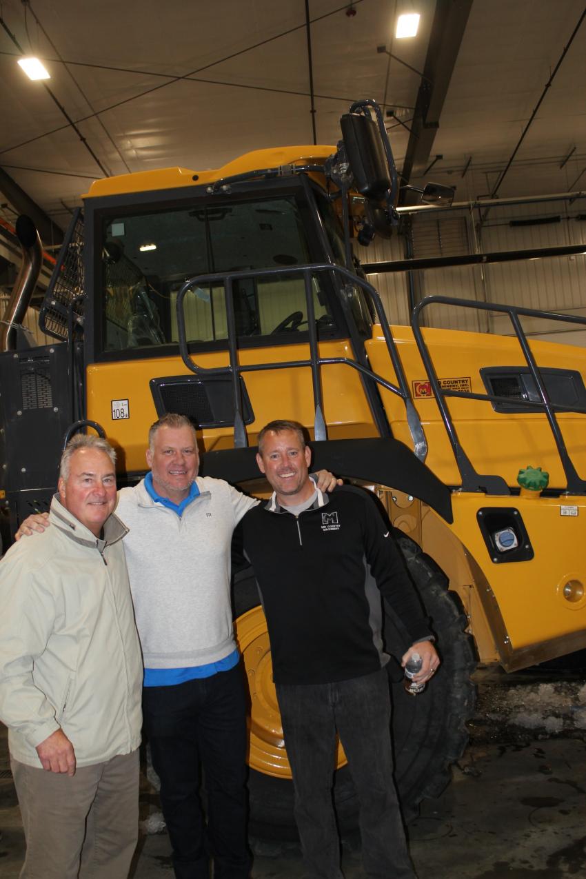 (L-R): Bill Czerwinski, vice president of Western region sales of Bell Trucks; Aaron Reicherts, sales representative of Mid Country Machinery; and Lucas Peed, co-owner and sales representative of Mid Country Machinery, are ready to help customers at the open house.
