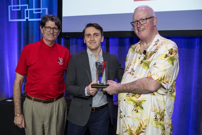 The Foundation Partner Award: (L-R) are Jeff Scott, AED Foundation chairman; Geoff Pace, e-Emphasys Technologies Inc.; and Brian McGuire, AED Foundation president.