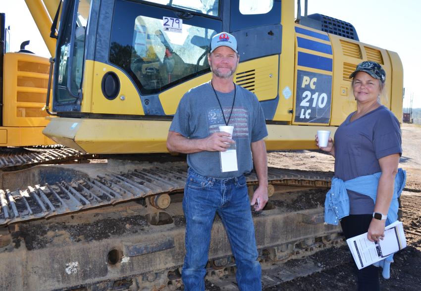 Enjoying their morning coffee and looking over several machines of interest are Scott Nettles and his wife, Kerrie, of RSI Industrial, Leakesville, Miss. (CEG photo)