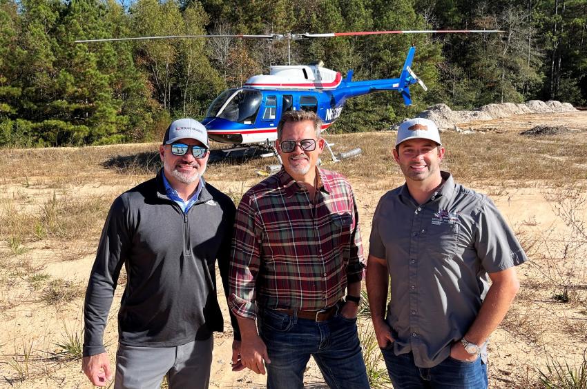(L-R):  Benji Richoux of Hancock Whitney Bank, Gulfport, Miss.; Ty Gill, Blackstar Helicopter, Picayune, Miss.; and Joey Spear, Greater Gulf Development, Gulfport, Miss.,   dropped in via helicopter in search of machine bargains on equipment sale day. (CEG photo)
