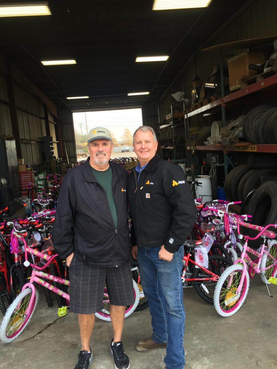 Mark Anderson (L), president and owner of Anrak Corporation, and Corey Wilson, general superintendent,  are ready to make Christmas a bit brighter for some kids this year.