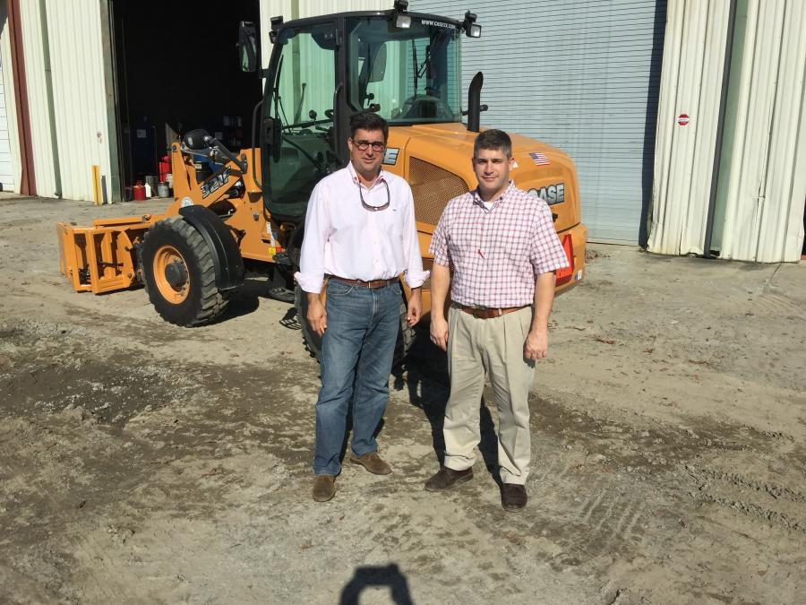 Jim Hills (L), president of Hills Machinery, and Mike Kemmerer, corporate service director.