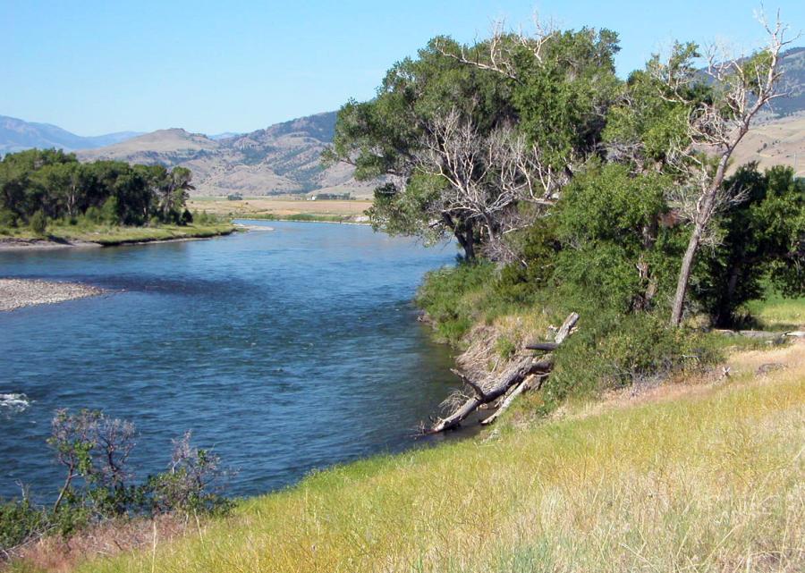 An agreement comes after environmental groups successfully sued to stop the $59 million dam along the Yellowstone near the Montana-North Dakota border.
