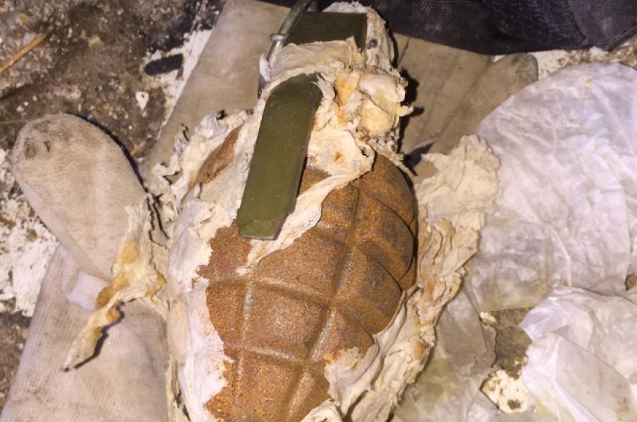 A moldy old grenade with the pin still in place was found at a construction site in lower Manhattan on Monday afternoon, prompting police to evacuate the block and summon the bomb squad.