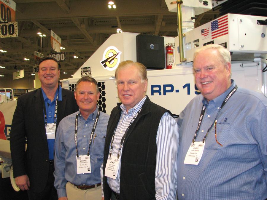 Meeting at Roadtec’s exhibit on the show floor (L to R) are Scott Collins, Tracey Road Equipment, East Syracuse, N.Y.; Michael Kvach, Roadtec Inc., Chattanooga, Tenn.; Jerry Tracey, Tracey Road Equipment; and Chris Connolly, Roadtec Inc.