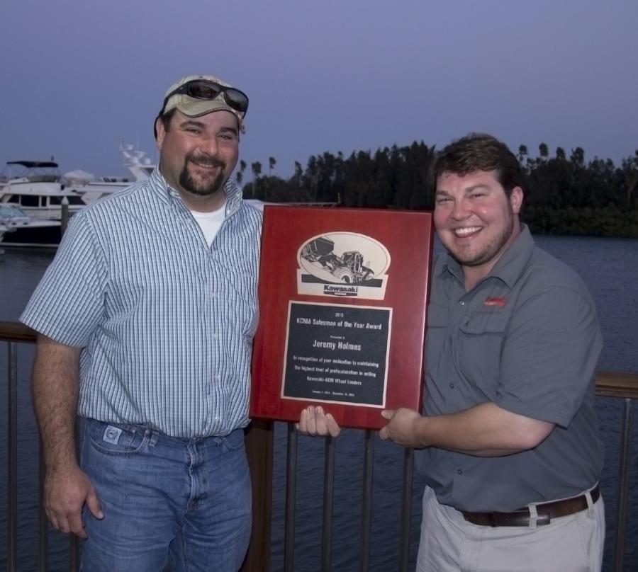 Jeremy Holmes (L), Amarillo Machinery, Amarillo, Texas, accepts his award from Adam Craft, KCMA regional sales manager, Texas.