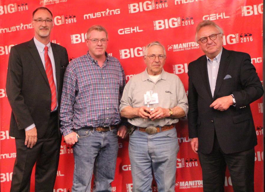 Dan Miller, President & CEO of Manitou Americas, and François Piffard, Executive VP of 
Sales and Marketing for Manitou Group, present the 2015 Gehl Top Dealer Award to 
Fritz Aschilman and Mike Tibbits from Farmer's Implement of Mineral Point .