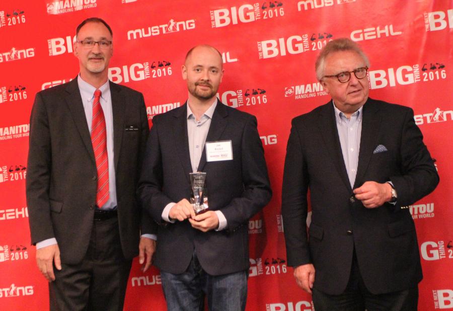 (L-R): Dan Miller, president and CEO of Manitou Americas, and François Piffard (R), executive vice president of sales and marketing of Manitou Group, present the 2015 Gehl Top Dealer Award to Joe Bozied of Stan Houston Equipment.