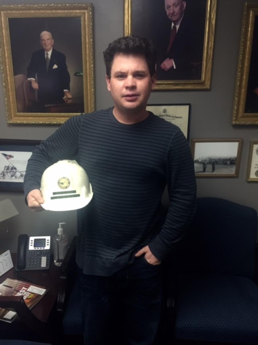 Rich Welch of the Welch Corporation received a hat from his cousin, Thomas Nolan.