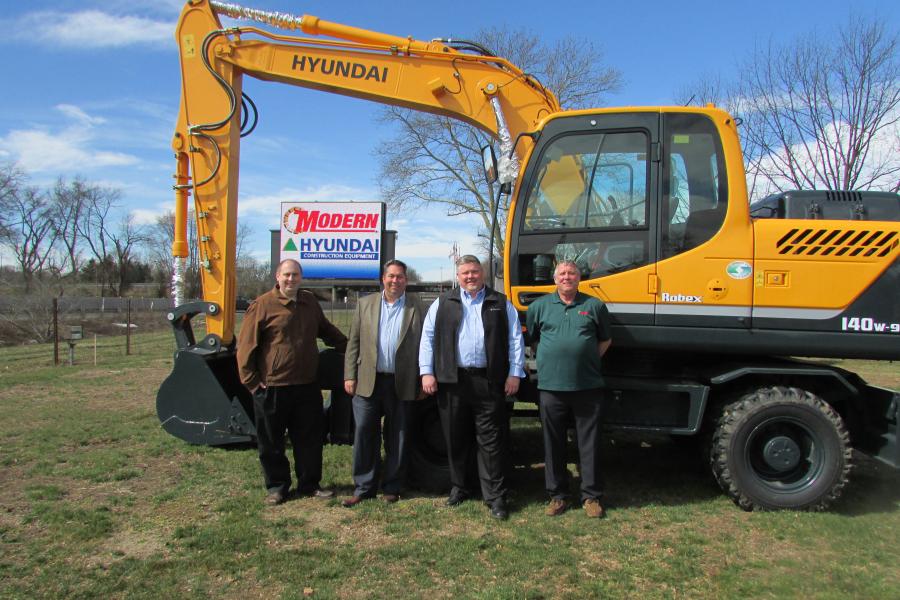 Proud to be representing the full Hyundai line (L-R) are Greg Plefka, marketing director; Sam Maury, general manager of the heavy construction equipment; Rick Nelson, vice president and general manager; and Mark Dombrowski, sales manager.