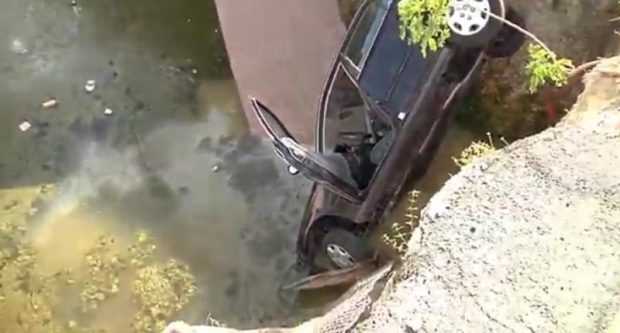 Image courtesy of WABC.  Authorities were called to the construction site about 9 a.m. and found the car in the 10-to 12-feet-deep ditch.