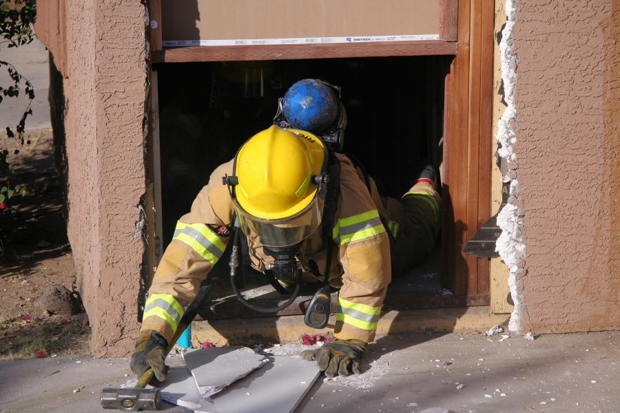 Because of structures the Arizona Department of Transportation has acquired in the future path of the  South Mountain Freeway, probationary firefighters with the Rural/Metro Fire Department were able to practice what’s known as a mayday scenario.