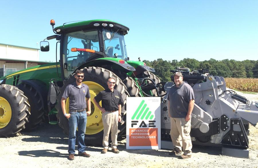 (L-R): FAE USA’s Stephen Leghissa; Atlantic Tractor’s Gary Sorrelle; and FAE USA’s Lee Smith stand in front of a JD 8370 with an FAE MTH attachment.