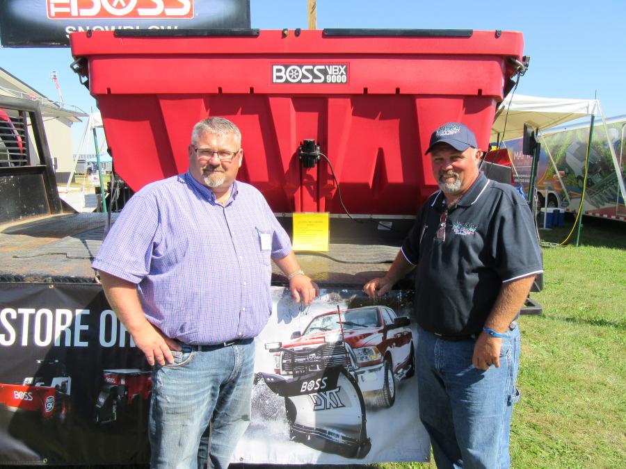 Kevin Flory (L) and Kevin Crawford, both of Mr. Plow Snow & Truck Equipment, talk about their lineup of snow plows and salt spreaders from Boss and other manufacturers.