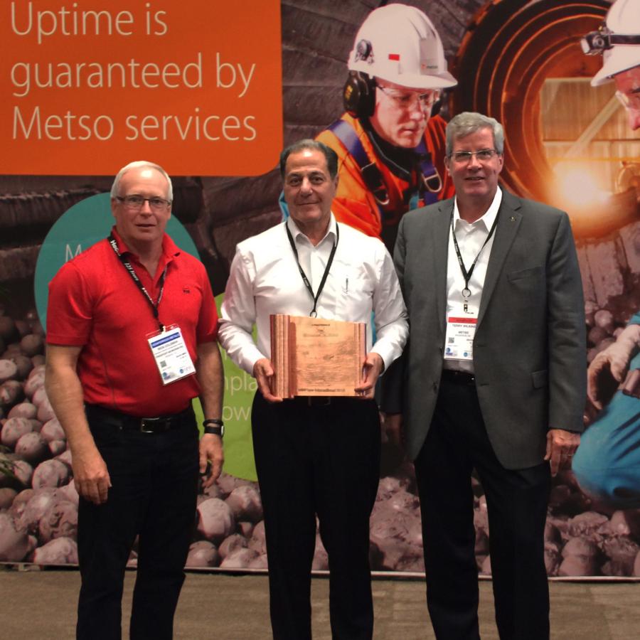Rick Coleman (Freeport-McMoRan), João Ney Colagrossi (Metso), and Terry J. Wilkins (Metso) accept copper scroll in recognition of long-term strategic partnership at MINExpo International 2016