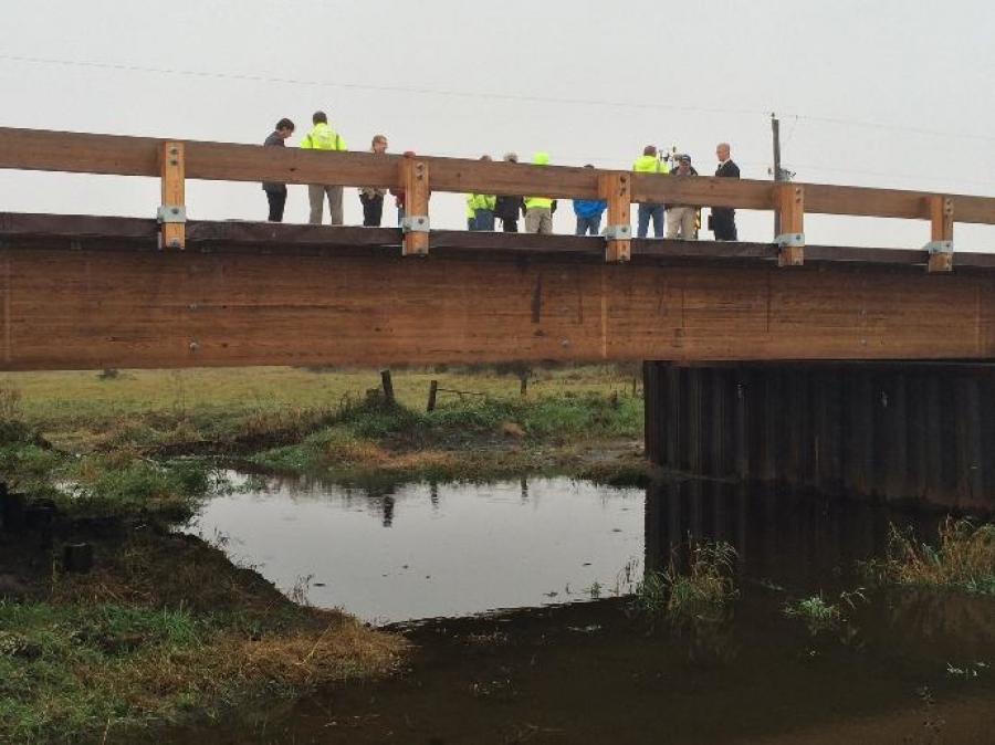 Image courtesy of KCRG.  Buchanan County engineer Brian Keierleber says one difference most people would notice right away is the material used—wooden beams instead of the usual concrete.
